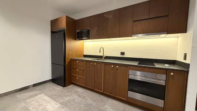 Departamento con balcón extendido, en piso alto, en Arthouse.