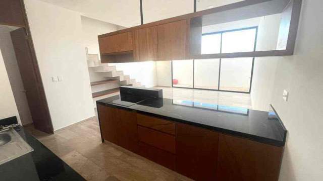 Townhouse de 2 recámaras, con rooftop y jacuzzi privado.