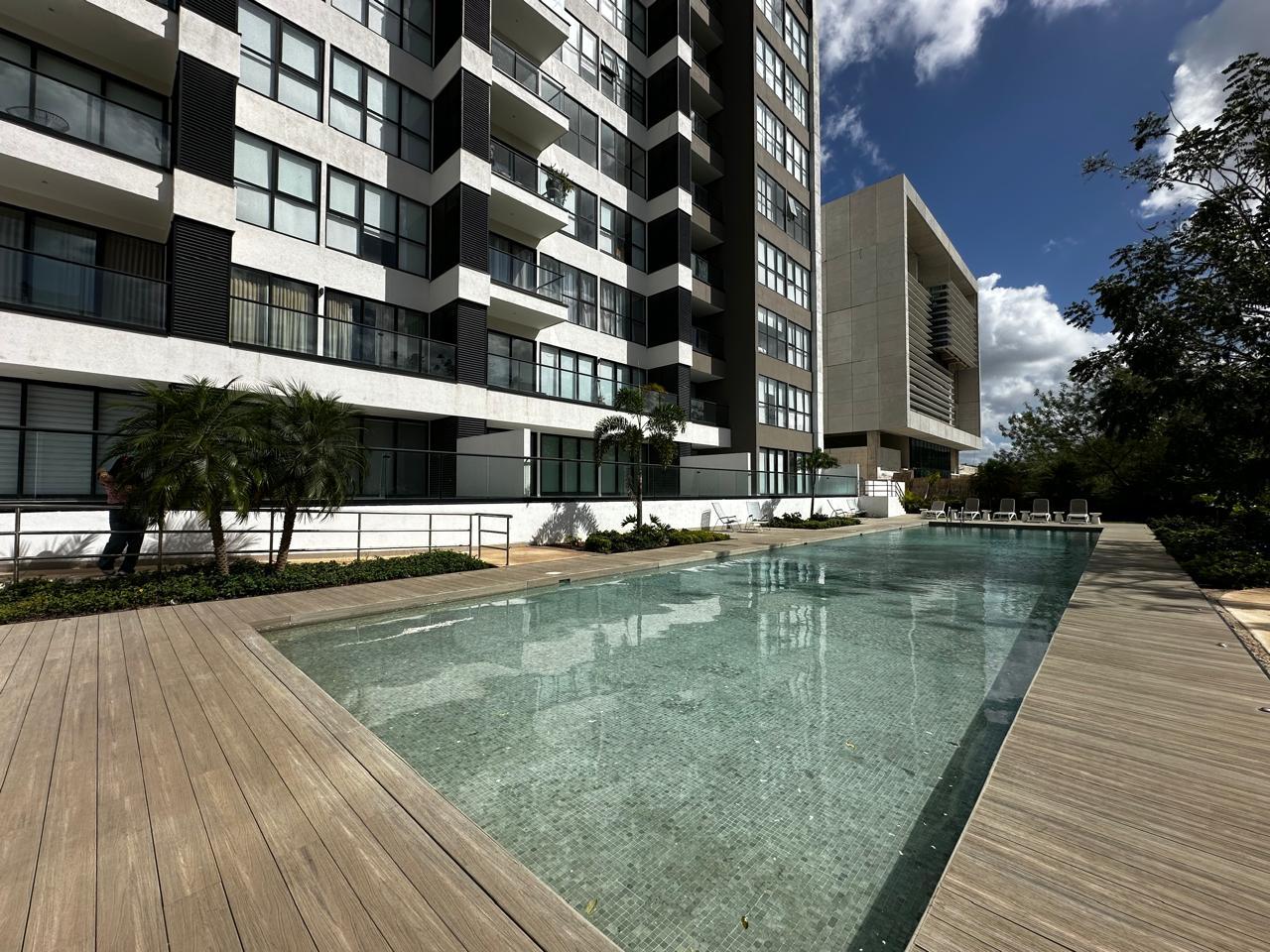 Departamento amueblado, en condominio con piscina y elevador.