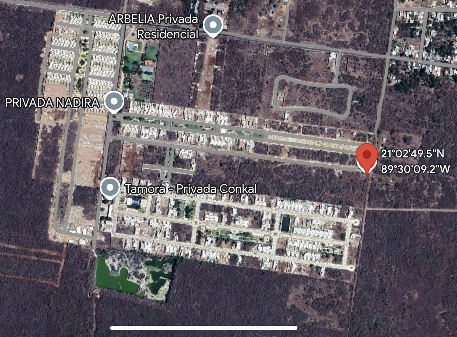 Terreno detrás de la privada Tamora de Conkal, ideal para desarrollo.